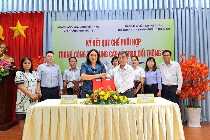 NHNN Khu vực 13 và Chi nhánh BHTG Việt Nam tại TP. Hồ Chí Minh ký kết Quy chế phối hợp trao đổi thông tin