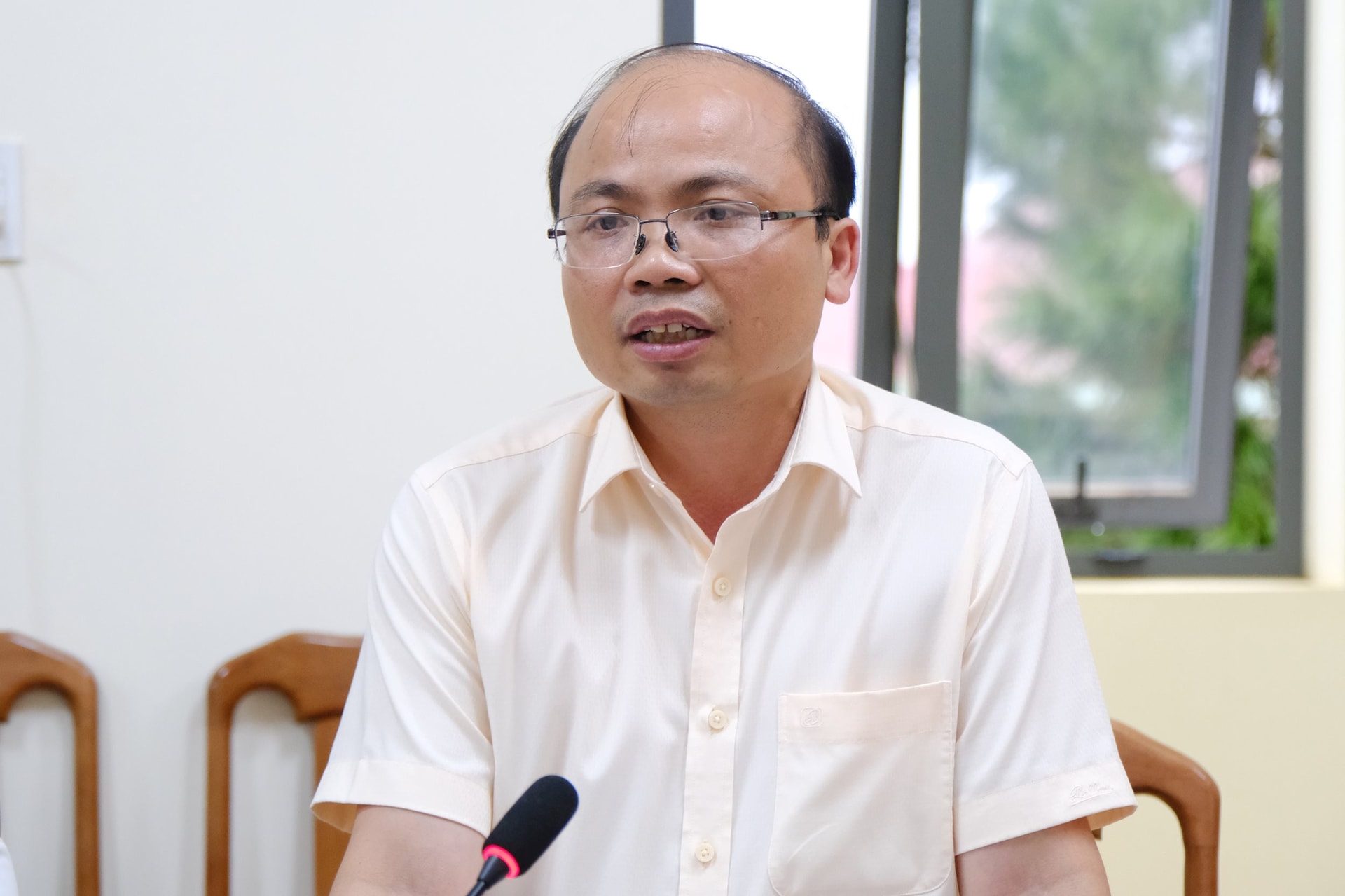 Bí thư Đảng ủy, Chủ tịch HĐND xã Hòa Ninh Trần Đức Công nêu khó khăn trong vận hành chính quyền hai cấp