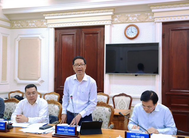 Đoàn công tác VPCP làm việc với UBND TPHCM về thực hiện Nghị quyết 66/NQ-CP và Nghị định 118/2025/NĐ-CP- Ảnh 3.