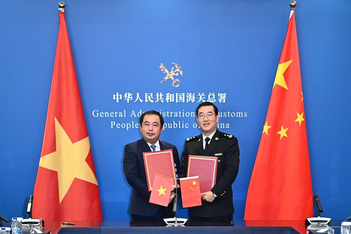 Nghị định thư về xuất khẩu mít tươi Việt Nam sang Trung Quốc được ký kết tại GACC sáng 27/11. Ảnh: Tùng Đinh.