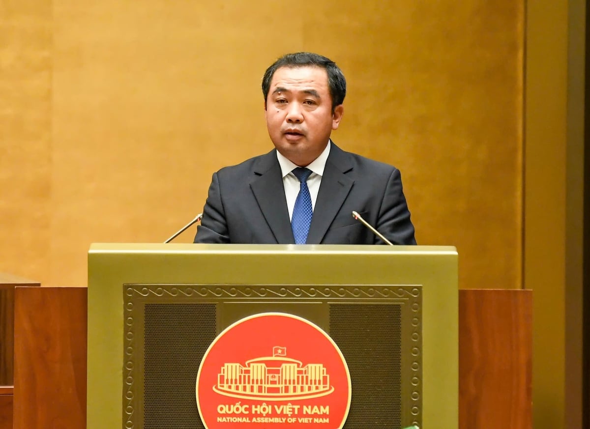 Bộ trưởng Trần Đức Thắng phát biểu tại Quốc hội. Ảnh: Như Ý.