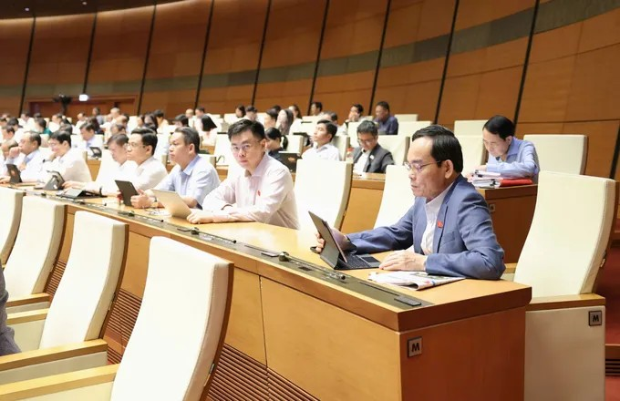 Bí thư Thành ủy TPHCM Trần Lưu Quang và các đại biểu dự họp. Ảnh: QUANG PHÚC