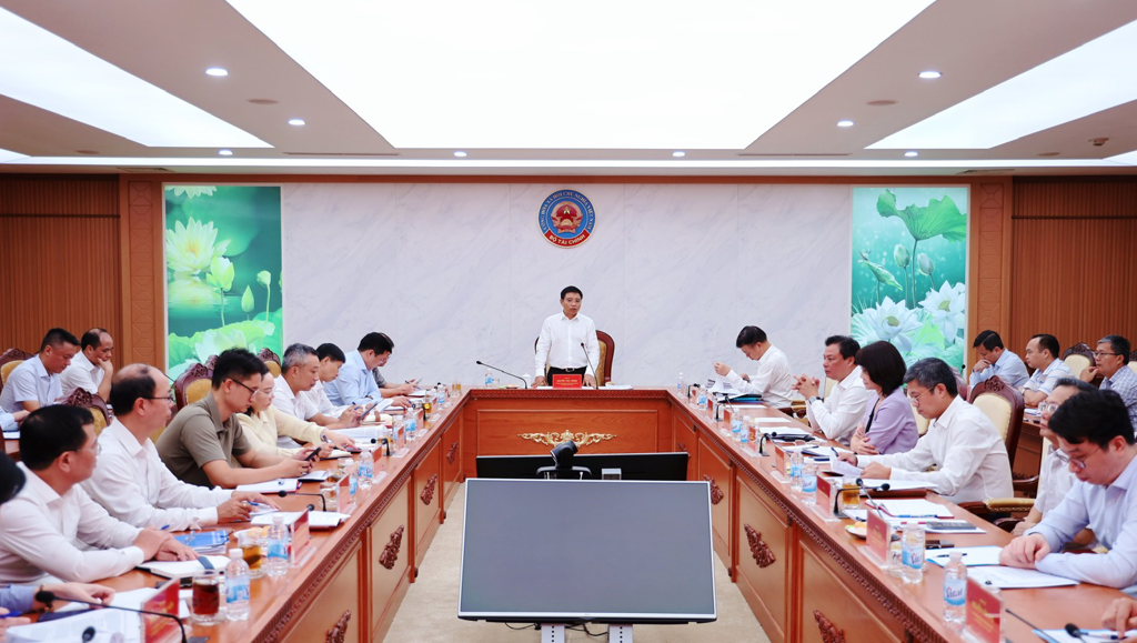 A group of people sitting at a table AI-generated content may be incorrect.