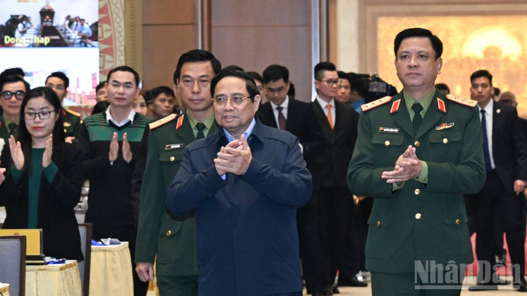 Thủ tướng Chính phủ Phạm Minh Chính tới dự Hội nghị tổng kết thực hiện chương trình hành động quốc gia khắc phục hậu quả bom mìn sau chiến tranh ở Việt Nam giai đoạn 2010-2025 và phương hướng nhiệm vụ giai đoạn tiếp theo. (Ảnh TRẦN HẢI) ndo_br_a1-3514-2284.jpg