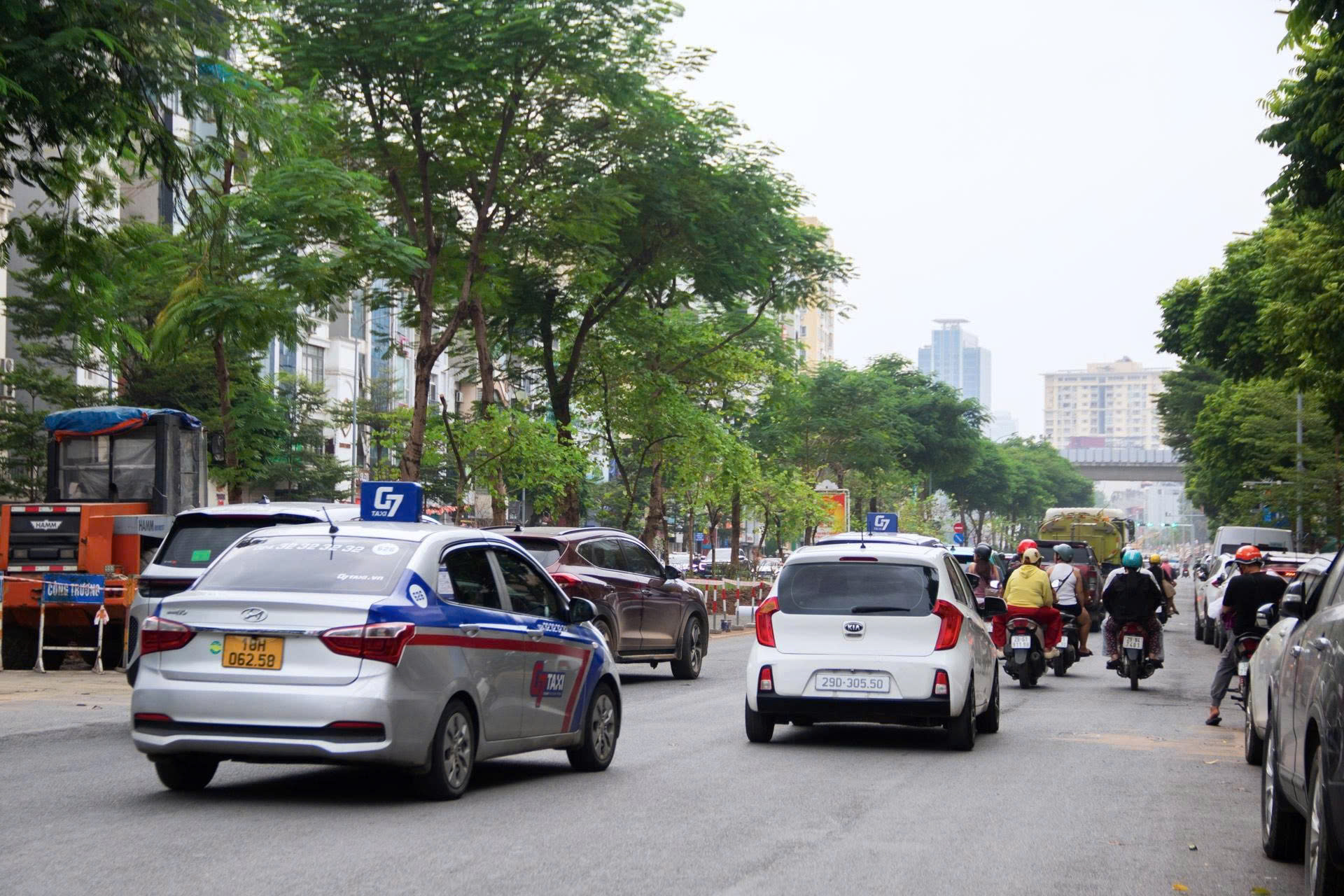 Cận cảnh: Hà Nội xén dải phân cách, mở rộng đường Ô Chợ Dừa để giảm ùn tắc - Ảnh 11.